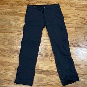 Charcoal “climbing” pants with lots of zippers and pockets. Unisex